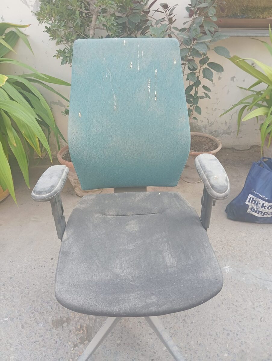 Office chair before cleaning