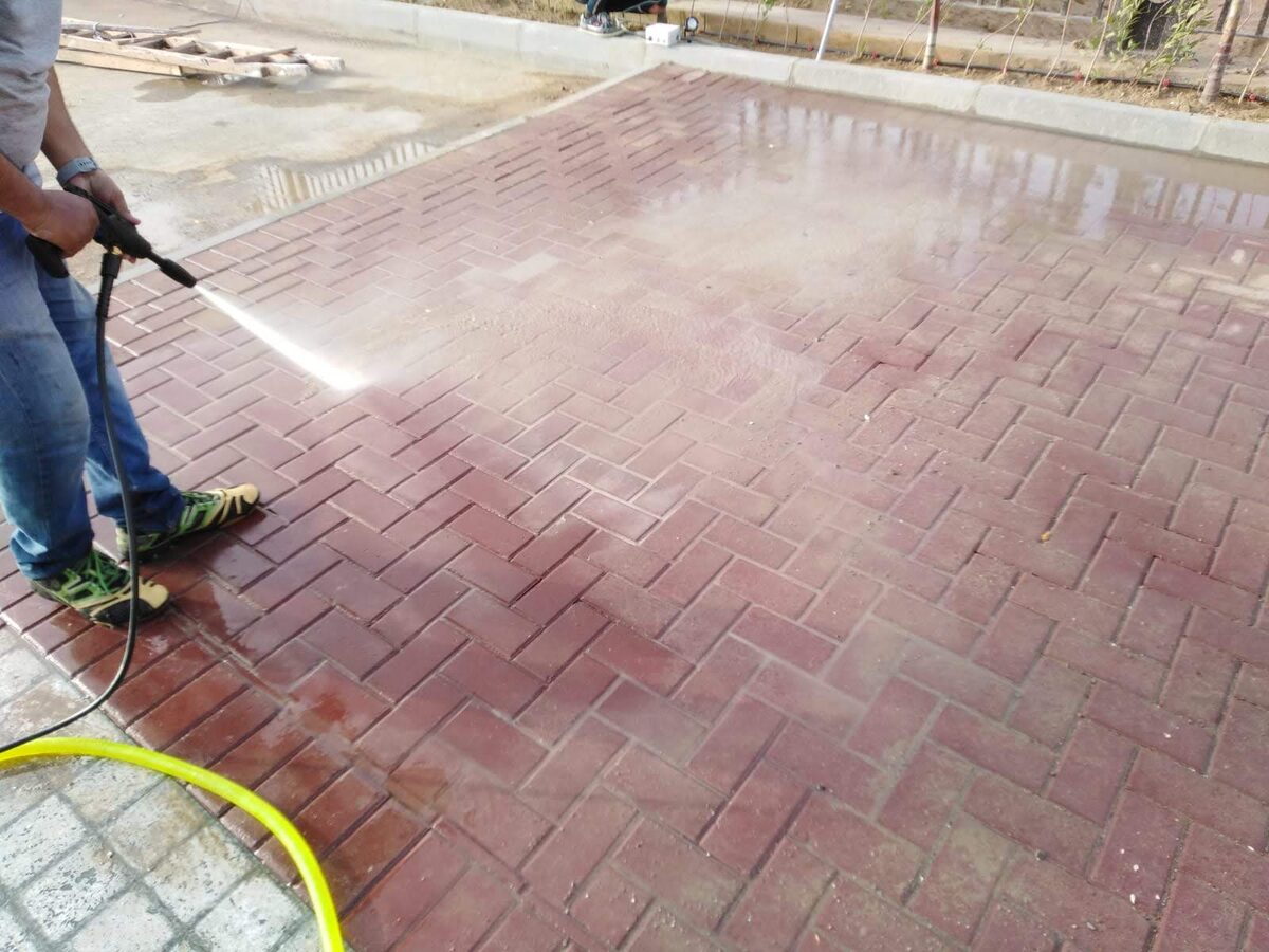 Pressure washing exterior pavement