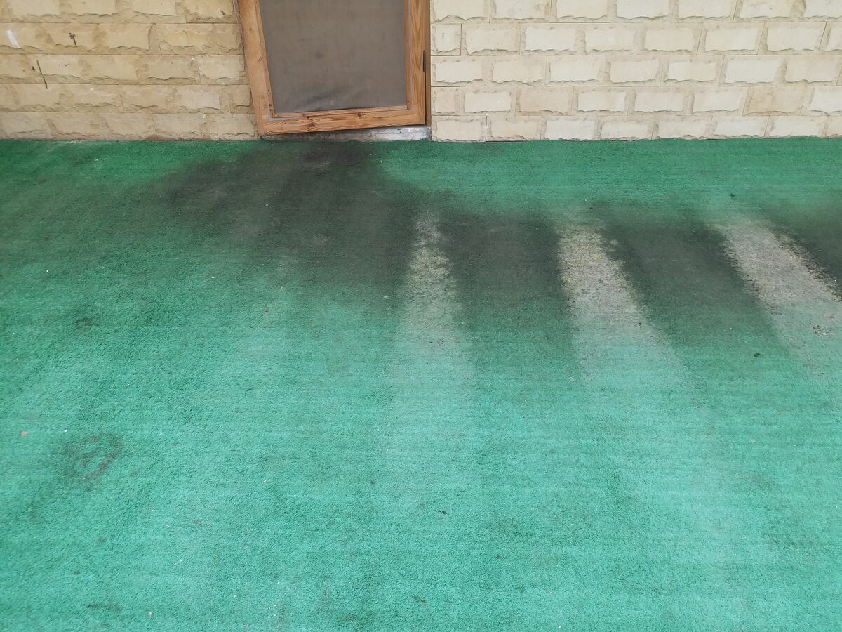 Outdoor carpet before cleaning